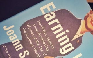 Close up of Joann Lublin's book "Earning It"