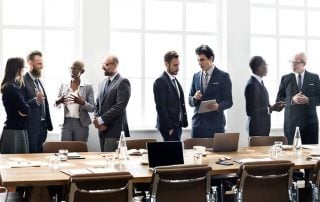 Boardroom meeting with female minority