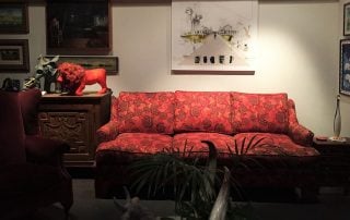 Room with red floral couch