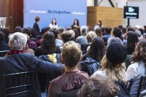 Audience members watch the "Journalism and the #Metoo moment" event