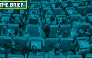 Overhead shot of seated conference attendees