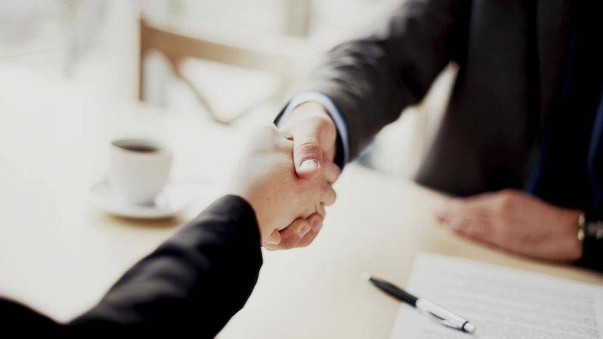 Hand shaking over a business deal