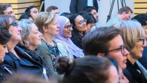 Audience smiling at the Lee Airton event