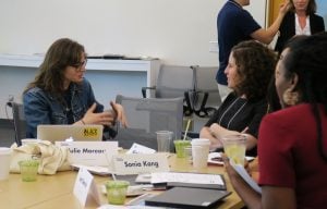 Julie Moreau speaks to Sonia Kang and group during Industry Partner Workshop