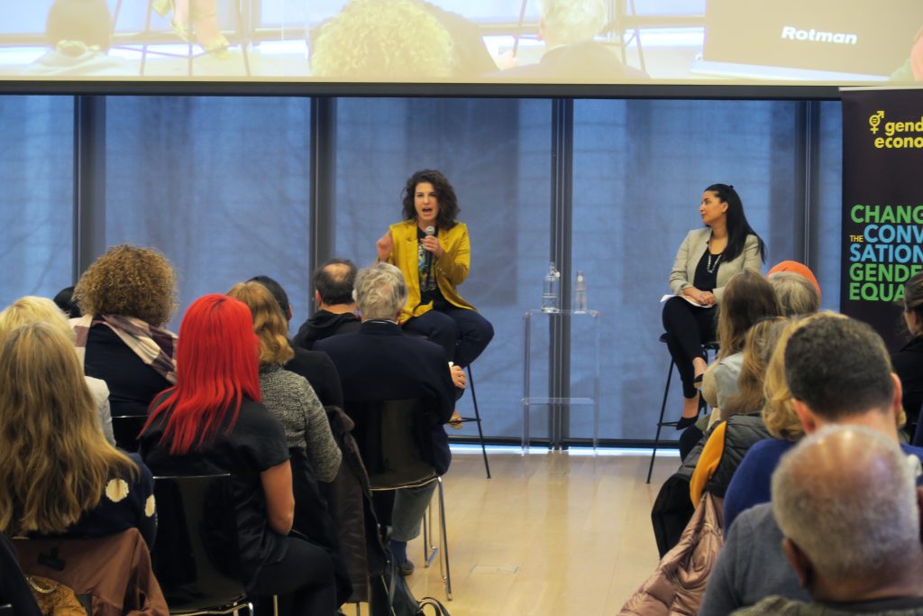 Audience members listen to Lauren Duca