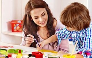 Mother working with child