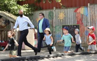 daycare exterior with kids running around