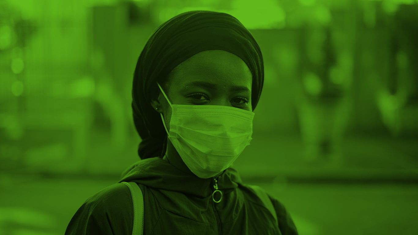 Closeup of woman wearing mask