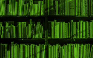 A photo of a library shelf filled with books